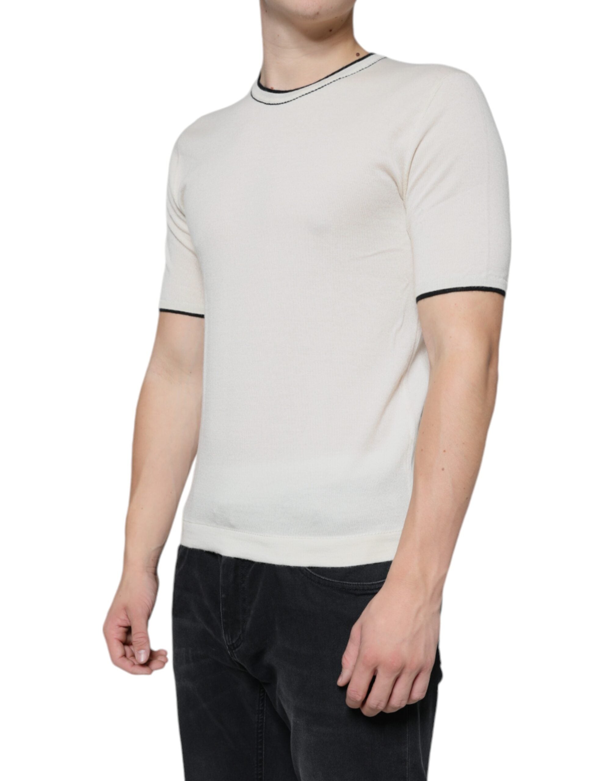 Dolce & Gabbana Off White cashmere short-sleeve T-shirt displayed on a hanger, showcasing soft fabric and classic fit.