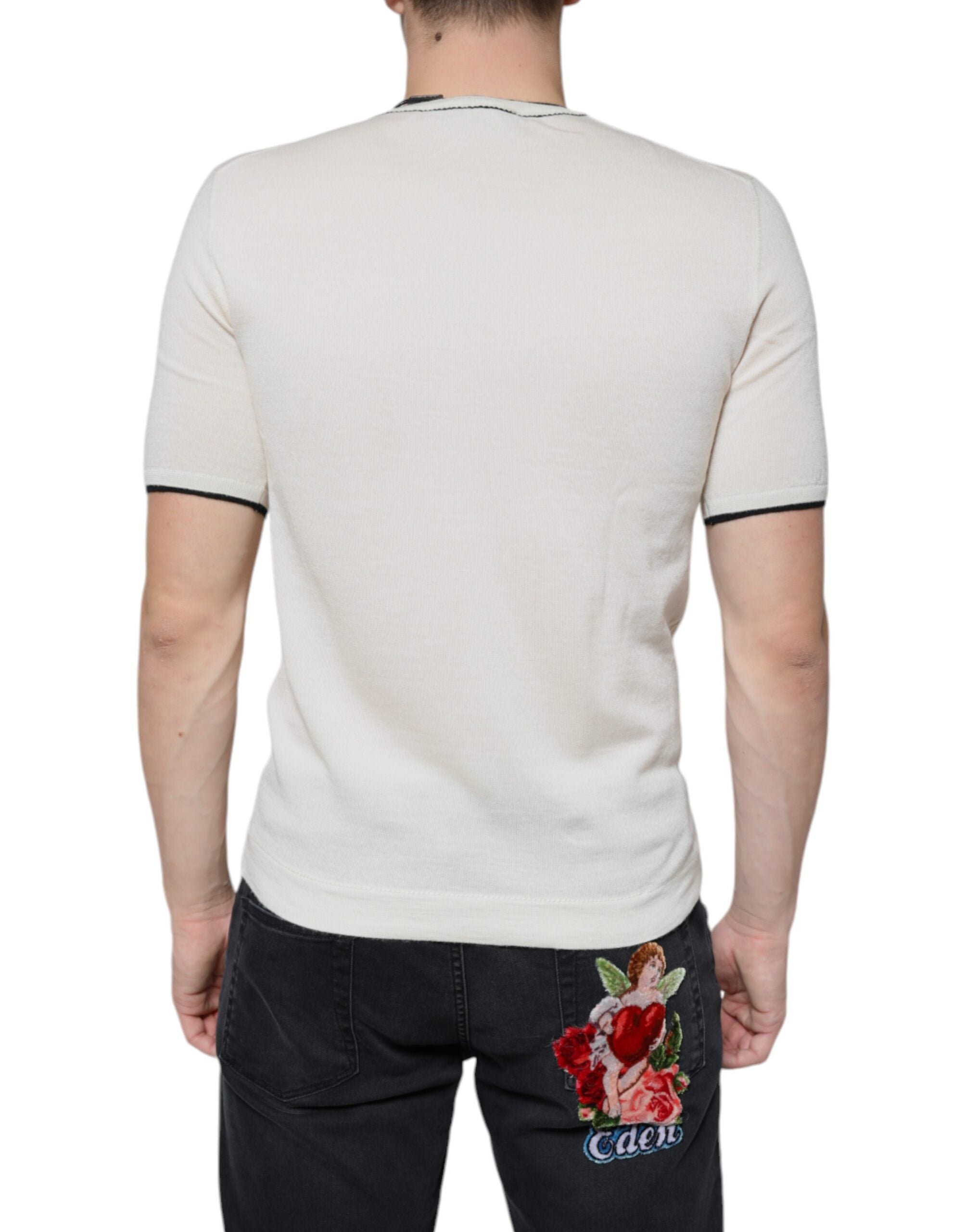 Dolce & Gabbana Off White cashmere short sleeve T-shirt displayed on a model, showcasing soft texture and stylish fit.