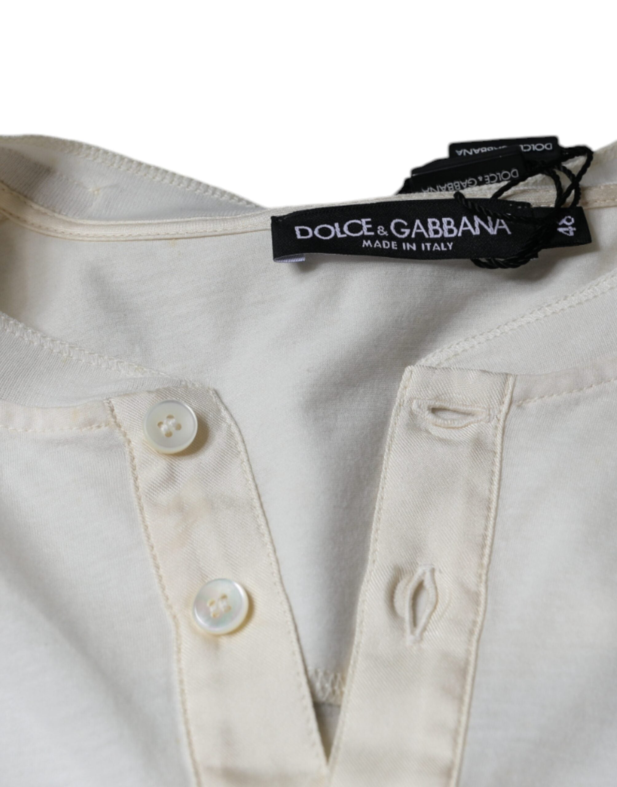 Dolce & Gabbana Off White cotton short-sleeve T-shirt with a simple crew neck, displayed flat on a white background.
