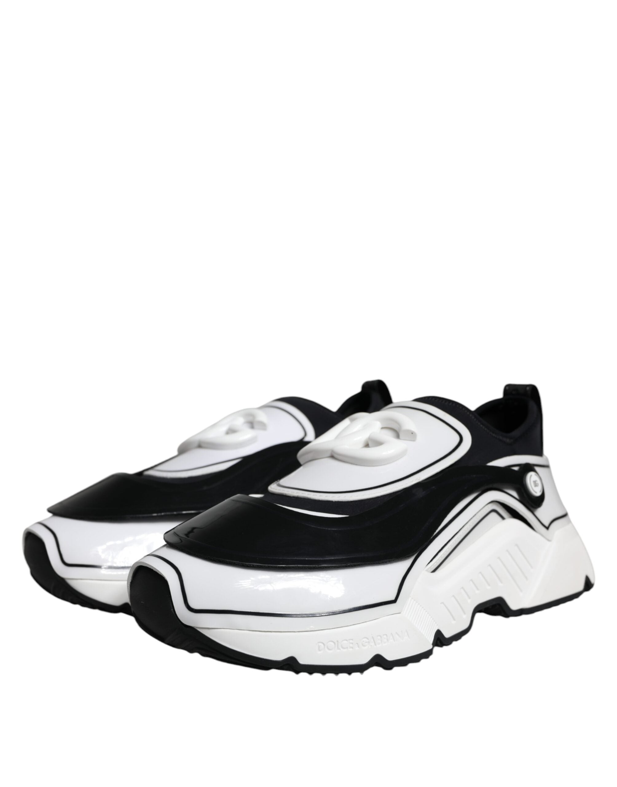 White and black Dolce & Gabbana Daymaster sneakers with logo plaque, featuring a sleek modern design and comfortable athletic style.