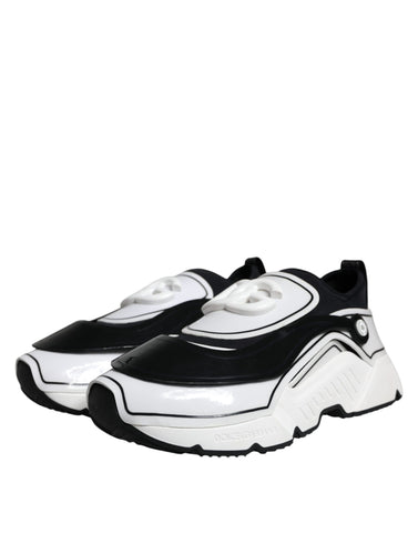 White and black Dolce & Gabbana Daymaster sneakers with logo plaque, featuring a sleek modern design and comfortable athletic style.