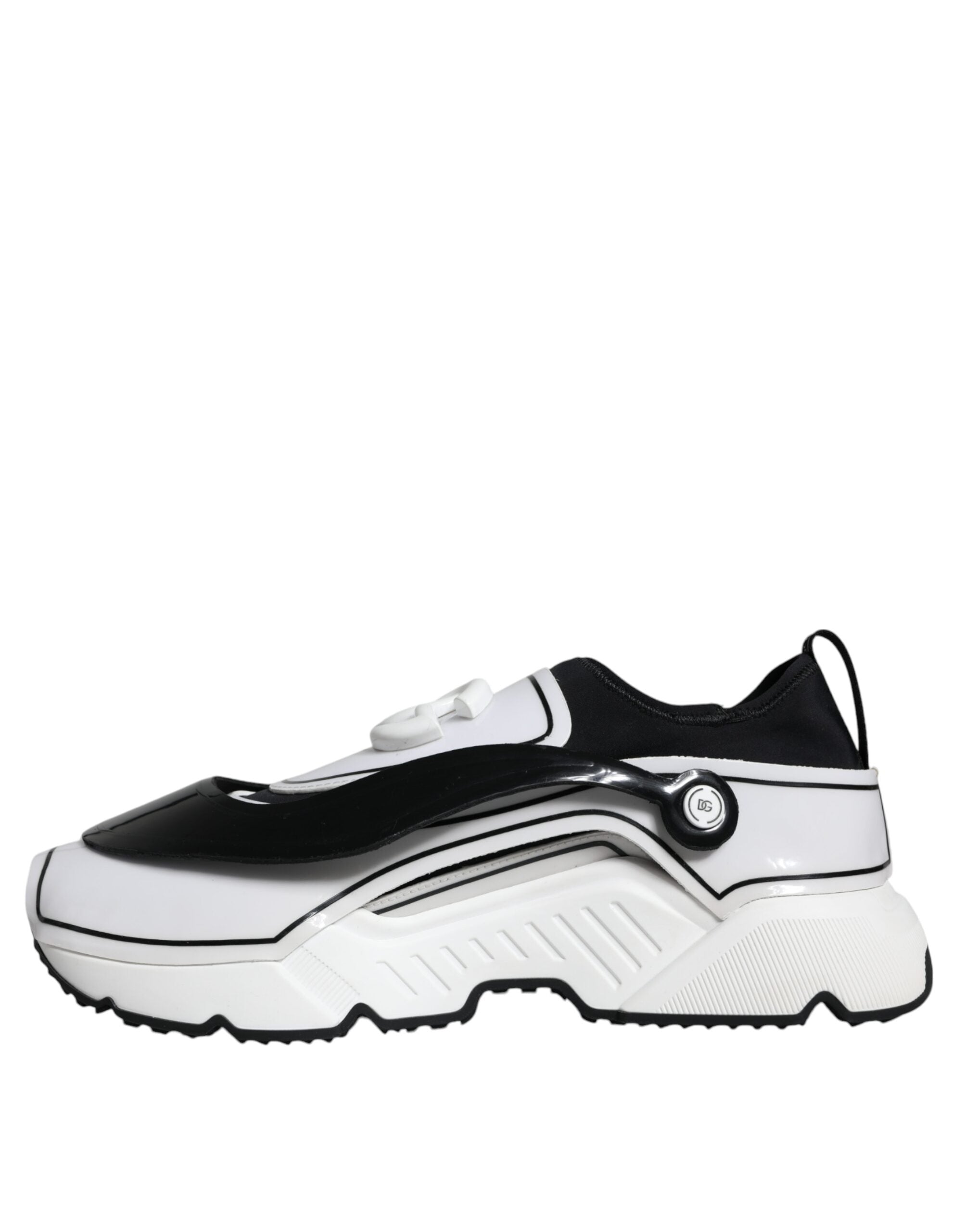 White Dolce & Gabbana Daymaster sneakers with black logo plaque and sleek design, showcasing stylish athletic footwear.