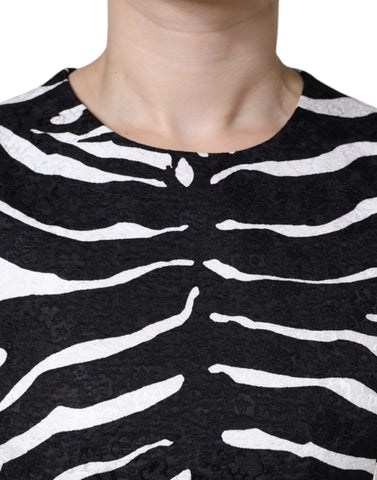 Black and white zebra print A-line sheath mini dress by Dolce & Gabbana, featuring a fitted silhouette and stylish design.