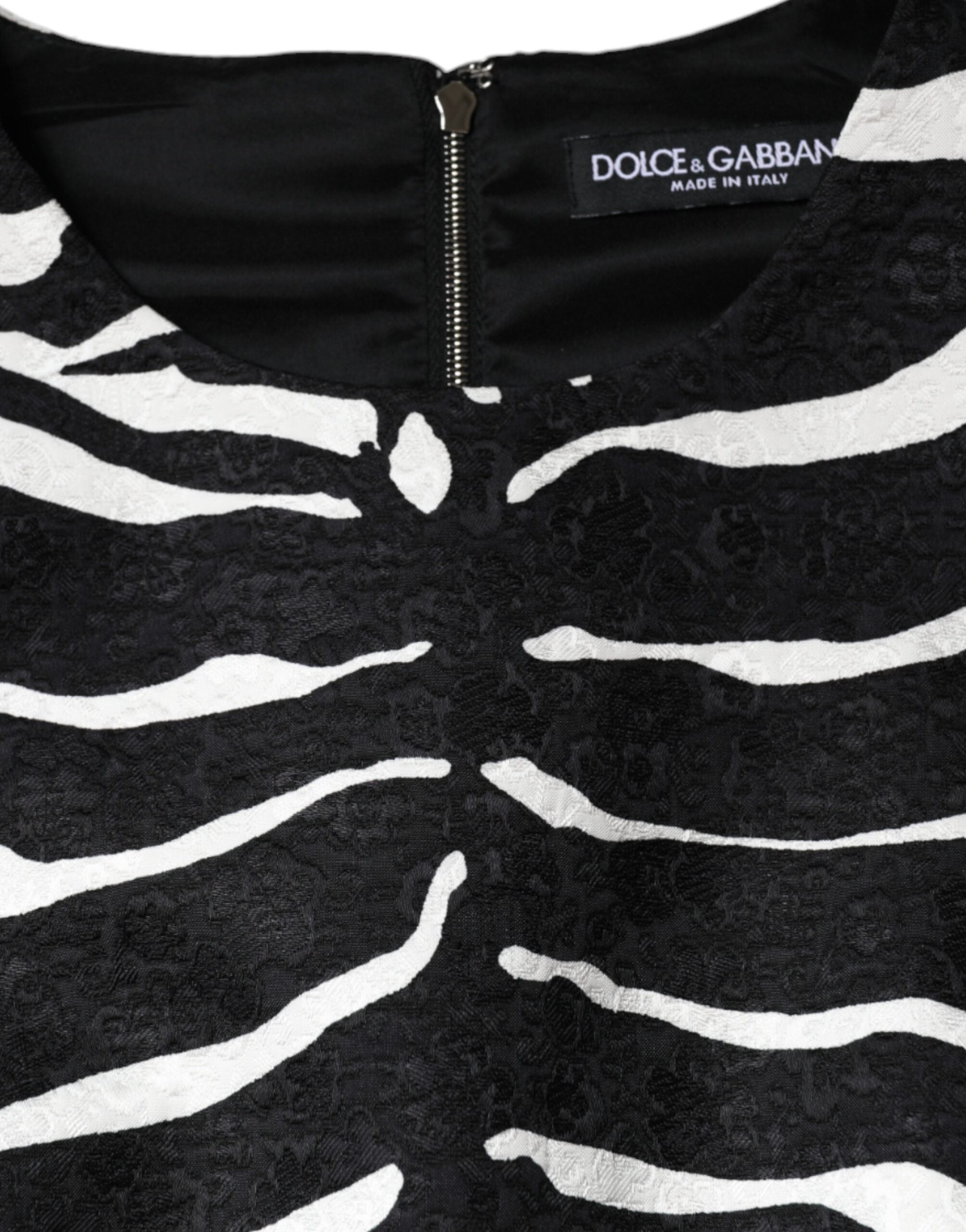 Black and white zebra print A-line sheath mini dress by Dolce & Gabbana, featuring a fitted silhouette and bold pattern.