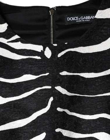 Black and white zebra print A-line sheath mini dress by Dolce & Gabbana, featuring a fitted silhouette and bold pattern.