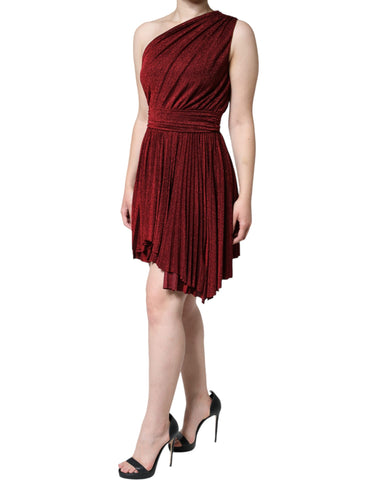 Red Dolce & Gabbana one-shoulder pleated A-line mini dress displayed on a mannequin, showcasing elegant design and fabric details.