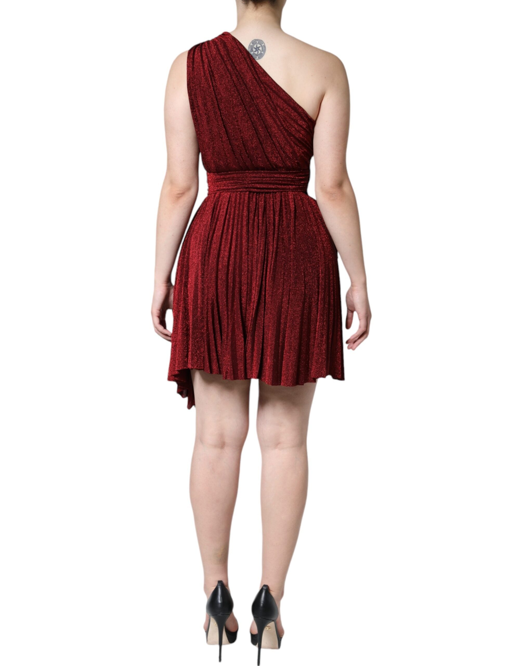 Red Dolce & Gabbana one-shoulder pleated A-line mini dress with flowing fabric and stylish design, shown on a model.