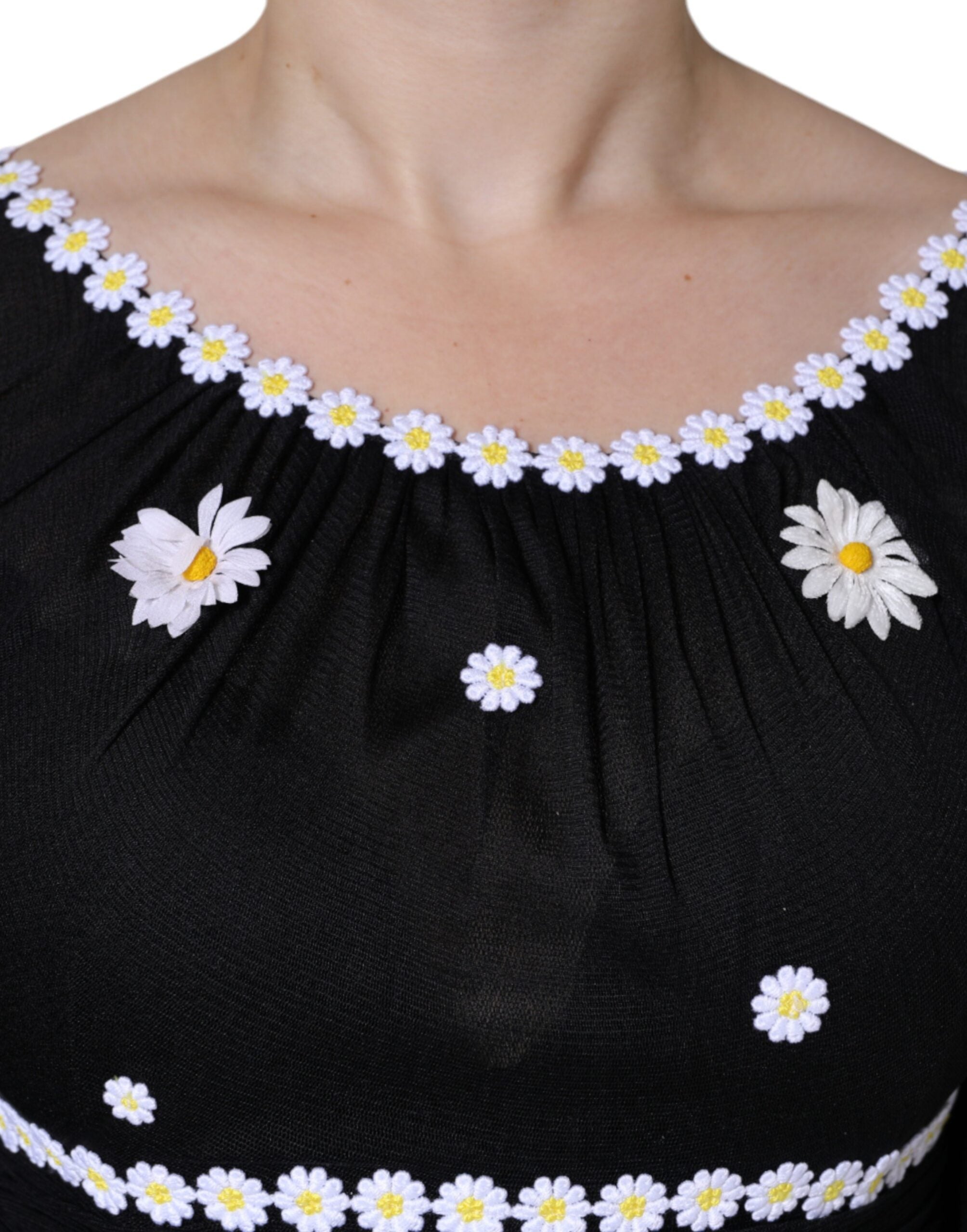Black silk Daisy A-line long maxi dress by Dolce & Gabbana, featuring elegant floral pattern and flowing silhouette.