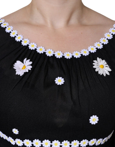 Black silk Daisy A-line long maxi dress by Dolce & Gabbana, featuring elegant floral pattern and flowing silhouette.