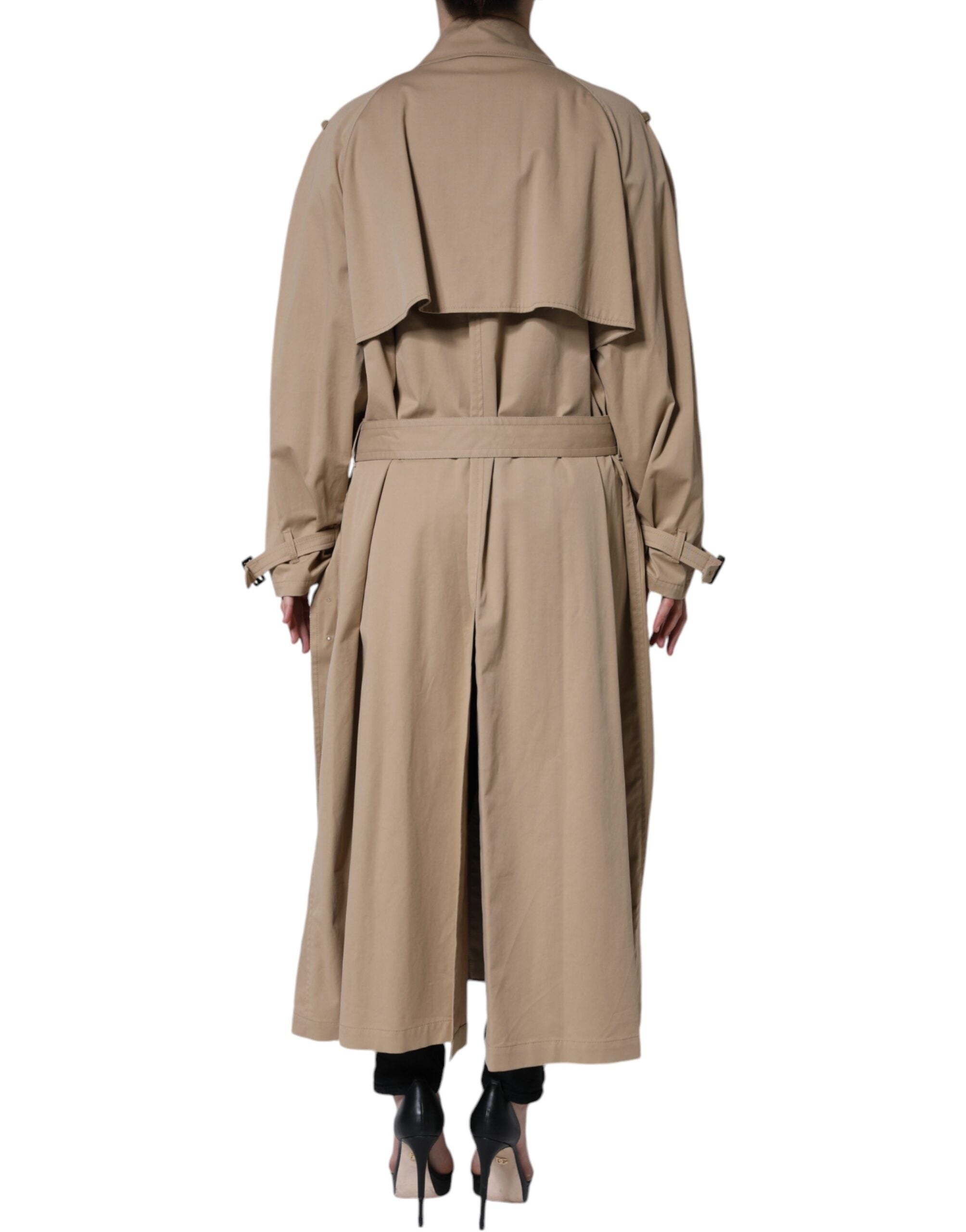 Dolce & Gabbana khaki double-breasted trench coat jacket with classic collar and button details, shown on a hanger.