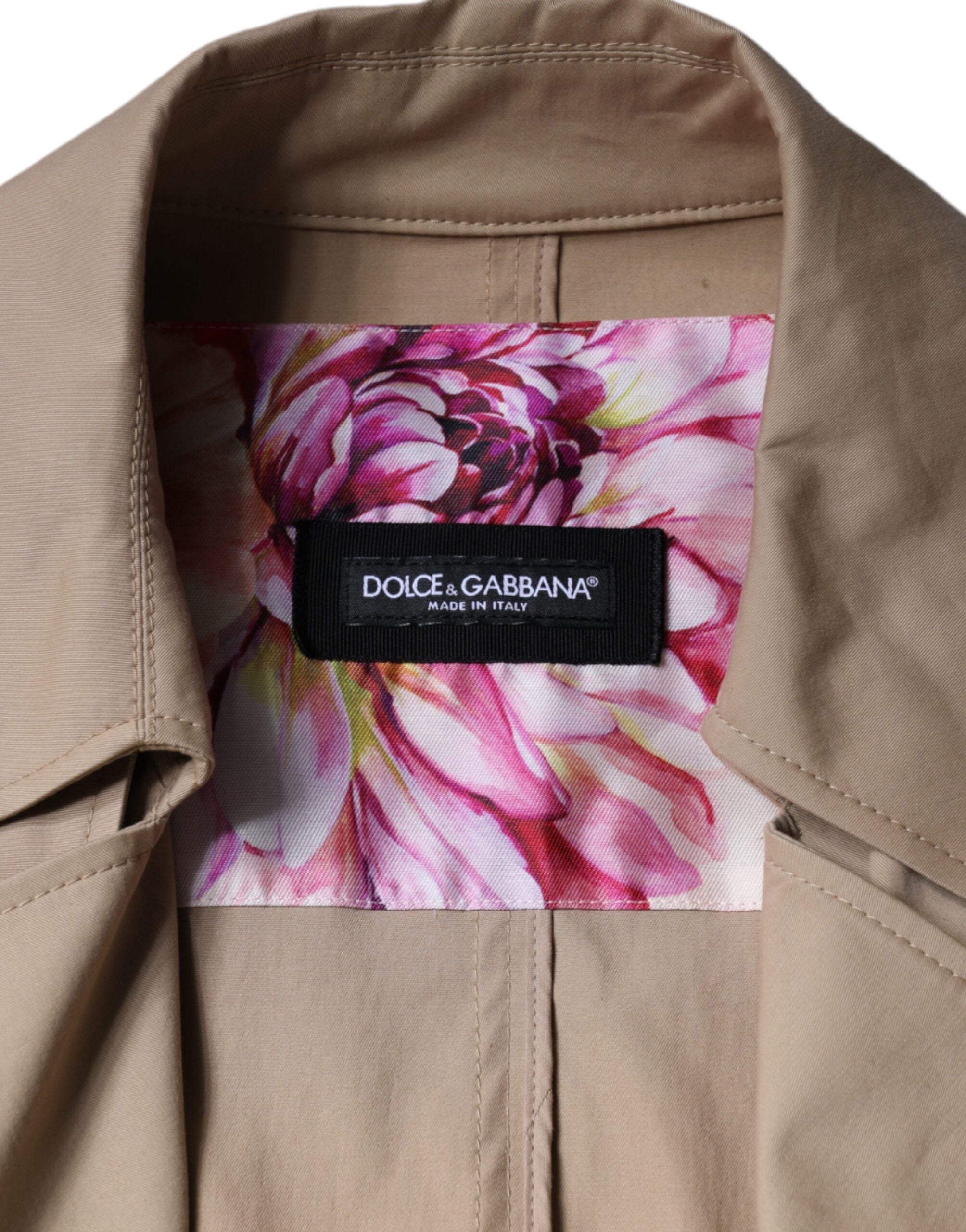 Dolce & Gabbana khaki double-breasted trench coat jacket with classic collar and belted waist, stylish outerwear for men or women.