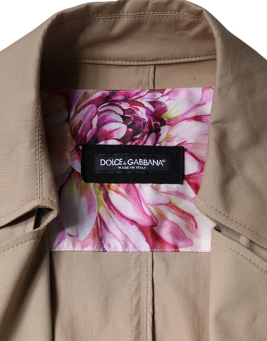 Dolce & Gabbana khaki double-breasted trench coat jacket with classic collar and belted waist, stylish outerwear for men or women.