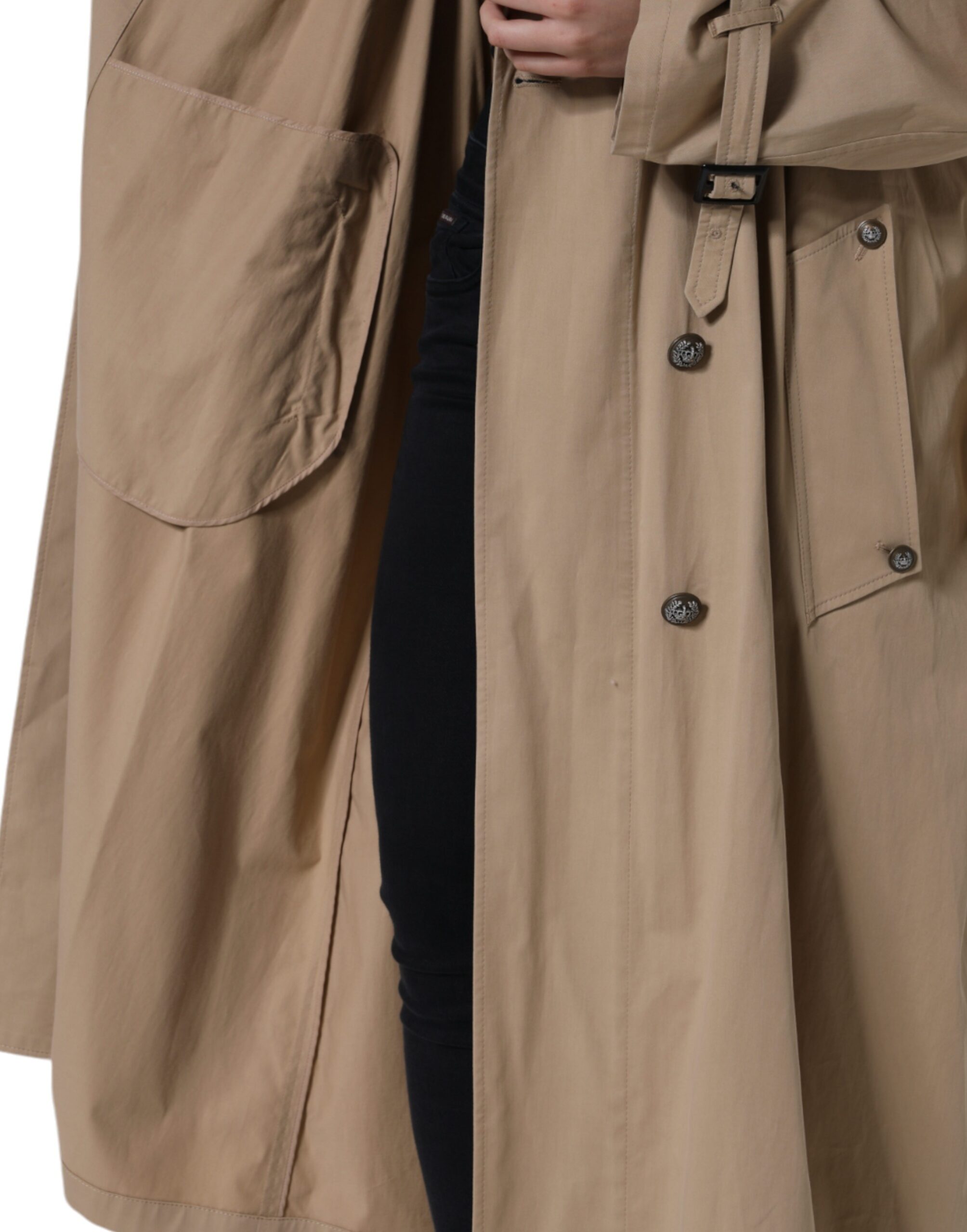 Dolce & Gabbana khaki double-breasted trench coat jacket with classic collar and belted waist, shown on model.