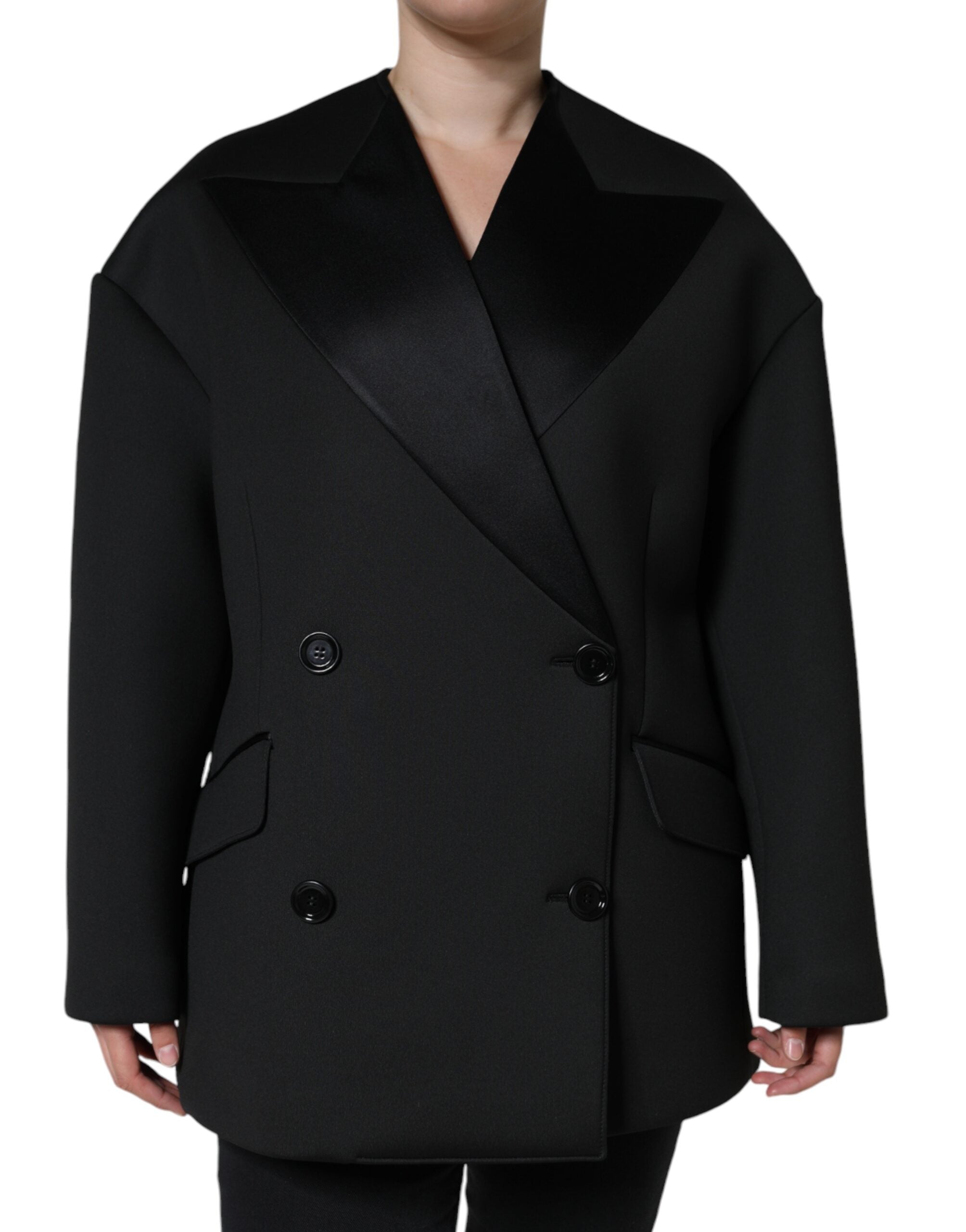 Black polyester double-breasted coat jacket by Dolce & Gabbana, shown on a hanger with visible lapels and button details.