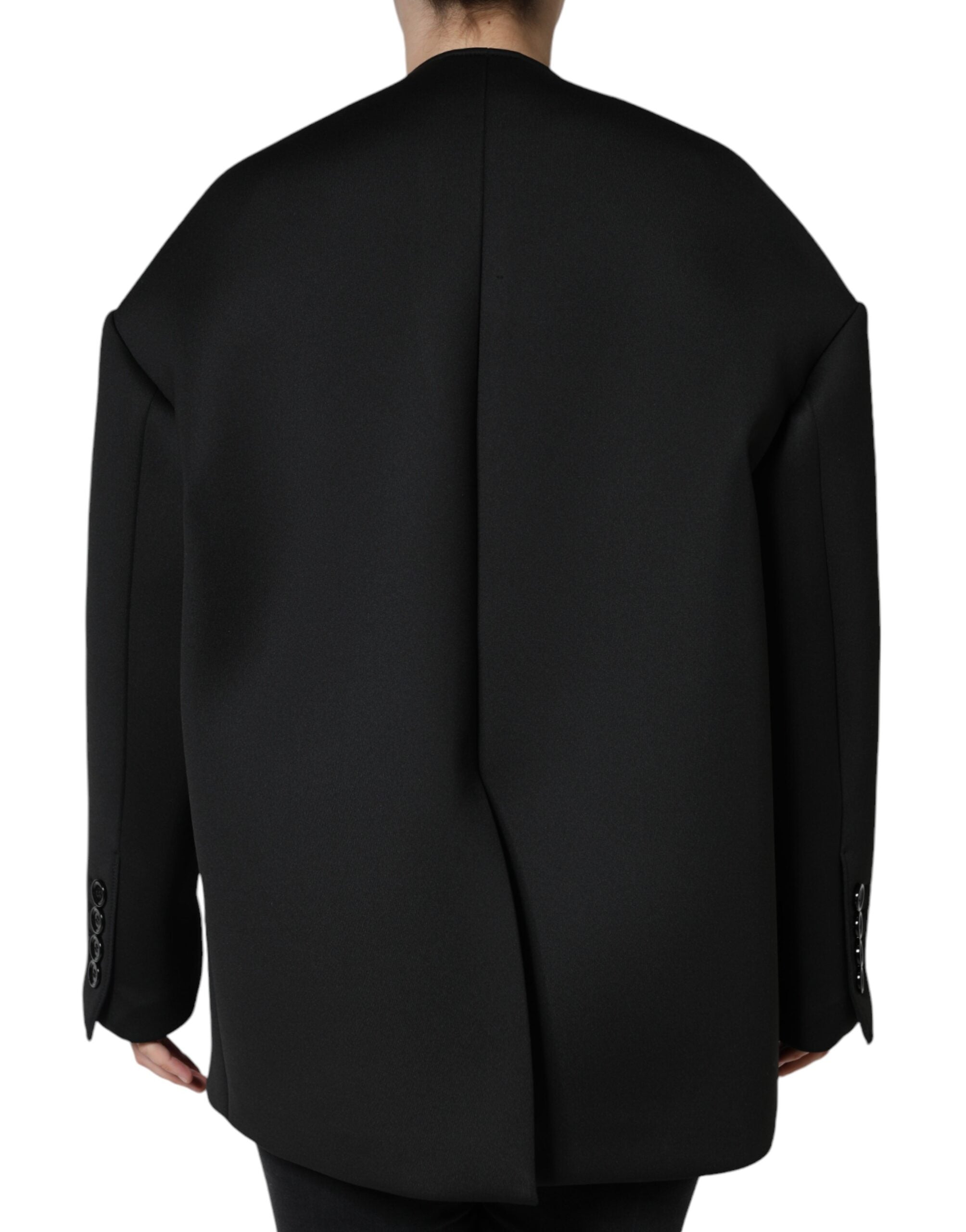 Black polyester double-breasted coat jacket by Dolce & Gabbana, featuring tailored fit and classic design.