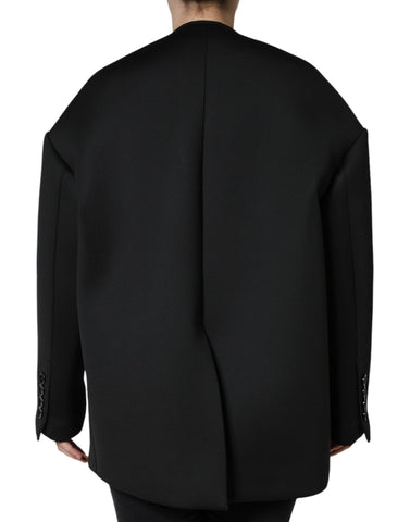 Black polyester double-breasted coat jacket by Dolce & Gabbana, featuring tailored fit and classic design.