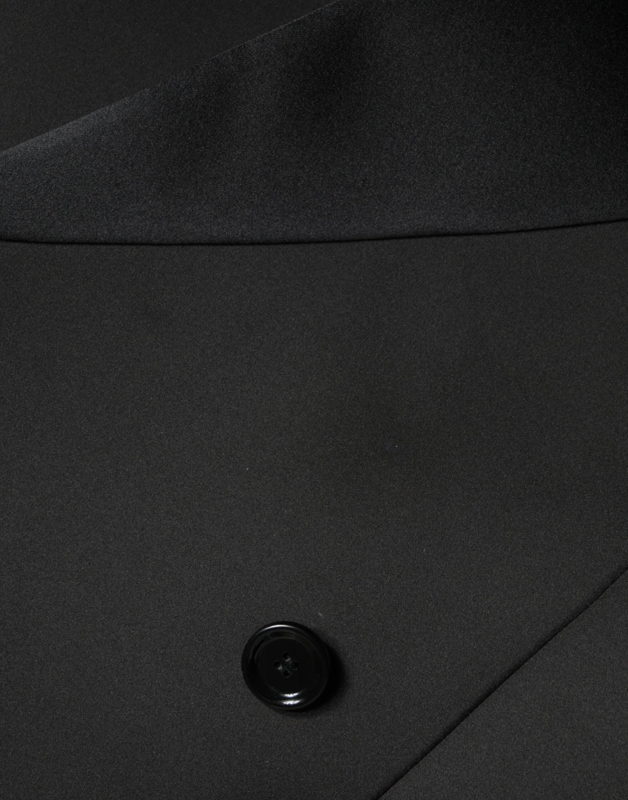Black polyester double-breasted coat jacket by Dolce & Gabbana, featuring classic design and tailored fit.