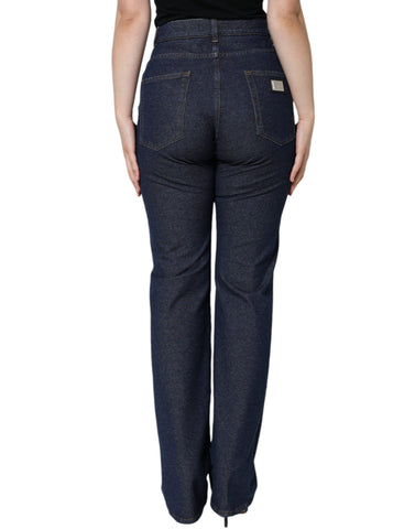 Dark blue cotton stretch straight denim jeans by Dolce & Gabbana displayed on a hanger with visible stitching and classic five-pocket design.