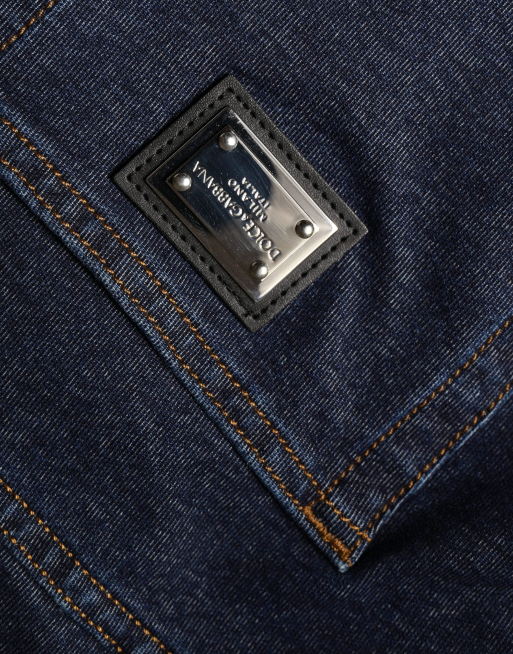 Dark blue cotton stretch straight denim jeans by Dolce & Gabbana, showing the front view with classic five-pocket design.