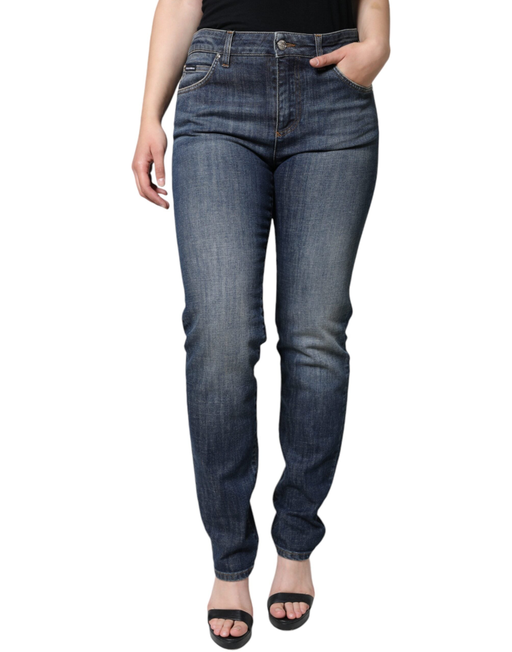 Dark blue cotton stretch skinny denim jeans by Dolce & Gabbana, showing close-up of fitted waistband and classic five-pocket design.