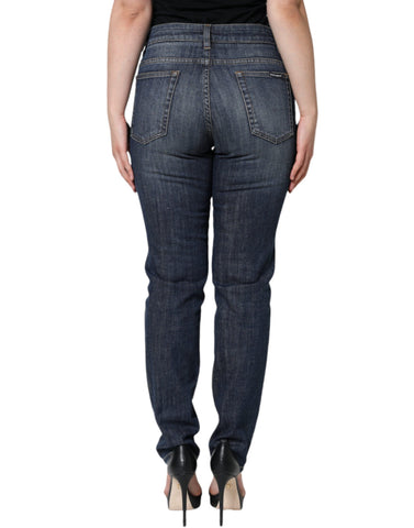 Dark blue cotton stretch skinny denim jeans by Dolce & Gabbana, close-up of fitted silhouette and classic five-pocket design.