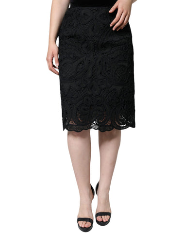 Black floral lace high waist pencil skirt by Dolce & Gabbana, showcasing intricate lace details and a fitted silhouette.
