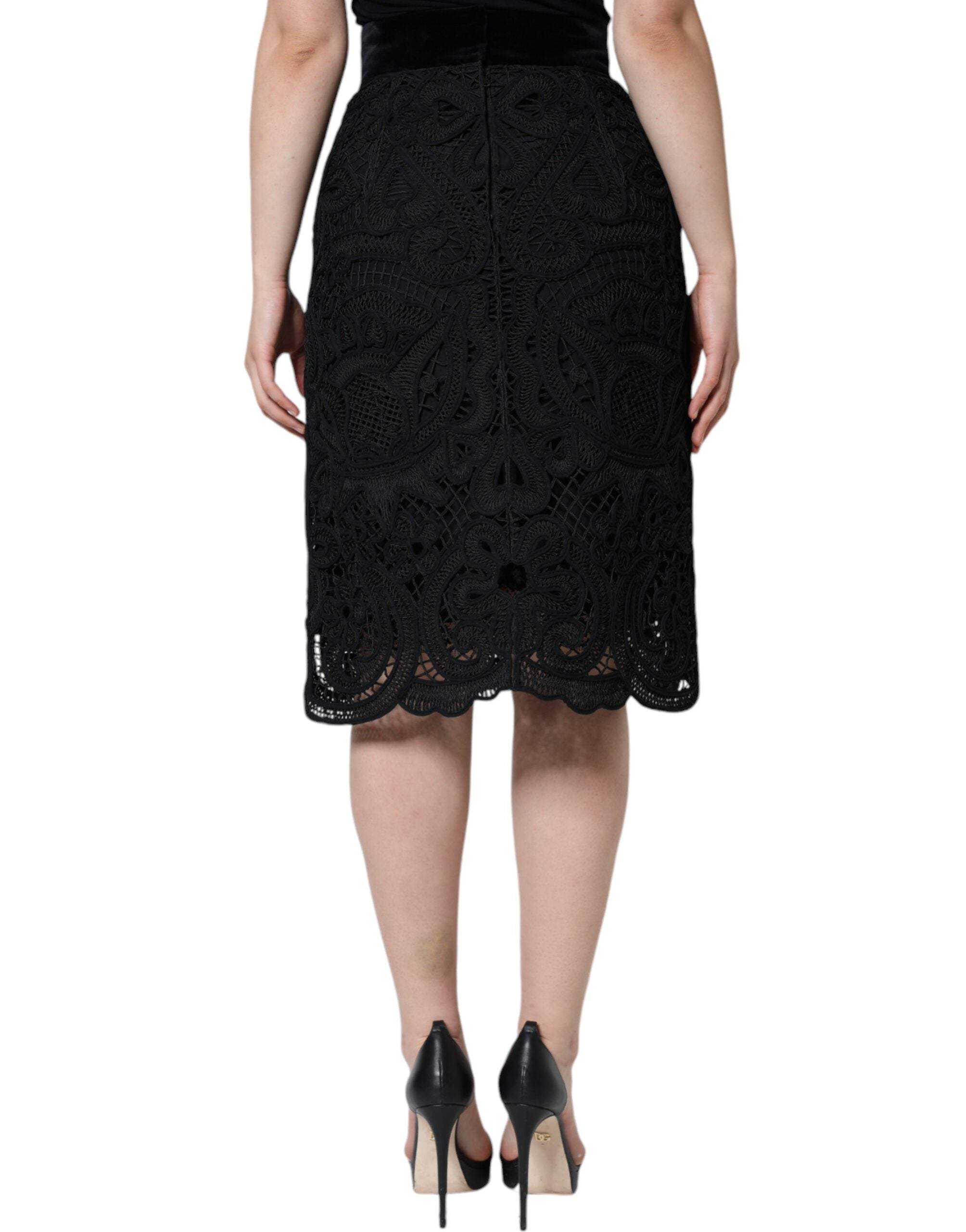 Black floral lace high waist pencil skirt by Dolce & Gabbana, featuring intricate lace details and a sleek, fitted silhouette.