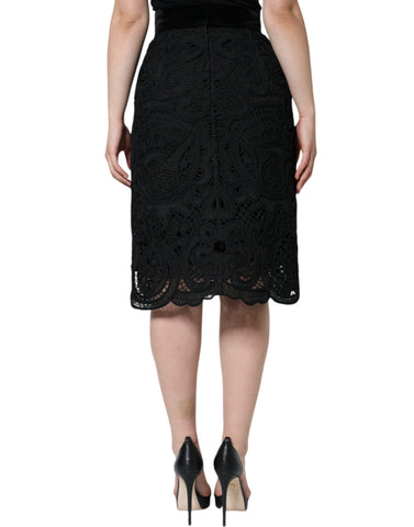Black floral lace high waist pencil skirt by Dolce & Gabbana, featuring intricate lace details and a sleek, fitted silhouette.