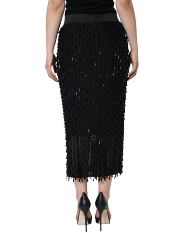 Black embellished pencil cut midi skirt by Dolce & Gabbana, featuring intricate detailing and a sleek, fitted silhouette.
