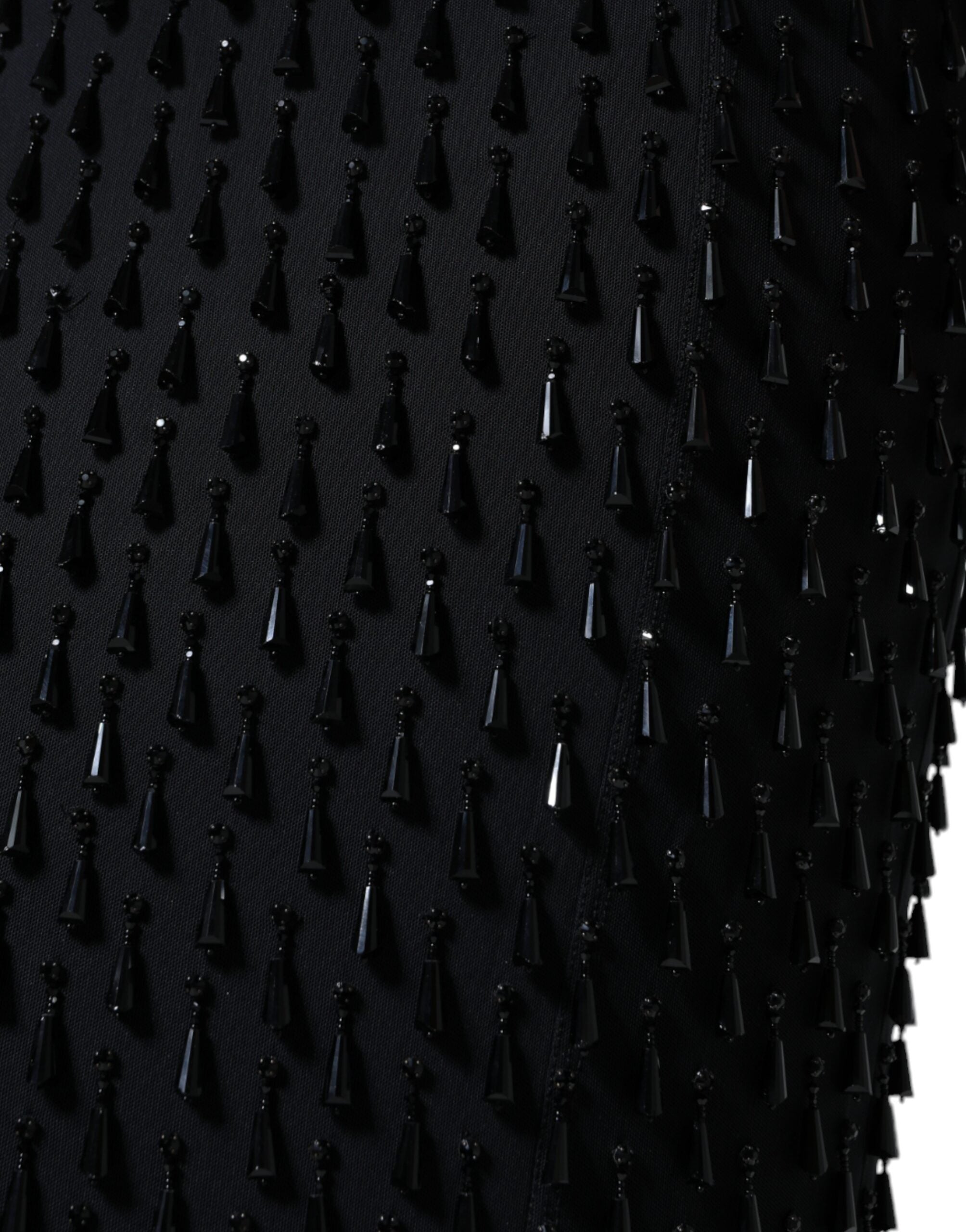 Black embellished pencil cut midi skirt by Dolce & Gabbana featuring intricate detailing and a sleek, fitted silhouette.