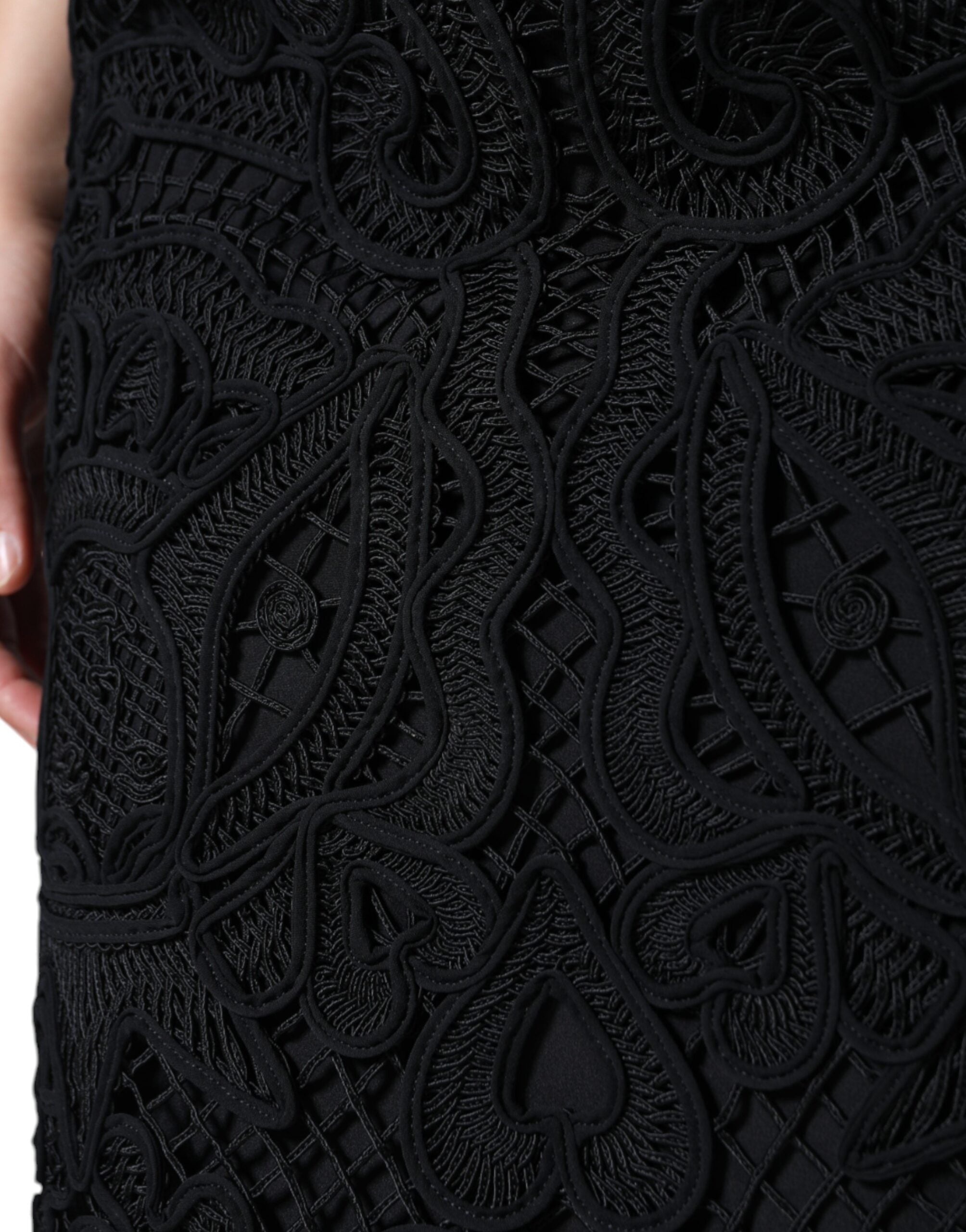 Black floral lace high-waist pencil skirt by Dolce & Gabbana, featuring intricate lace details and a sleek, fitted silhouette.