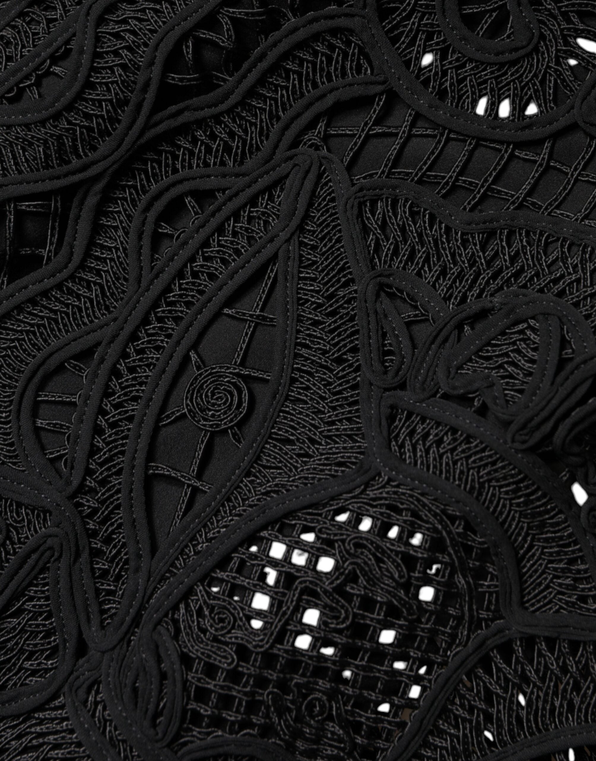 Black floral lace high-waist pencil skirt by Dolce & Gabbana, showcasing intricate lace details and a fitted silhouette.