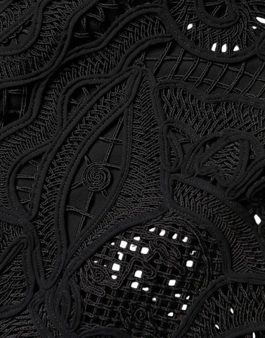 Black floral lace high-waist pencil skirt by Dolce & Gabbana, showcasing intricate lace details and a fitted silhouette.