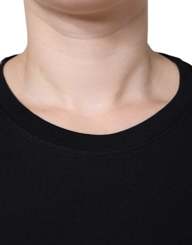 Black cotton crew neck short sleeve T-shirt by Dolce & Gabbana, showing a close-up of the fabric and neckline.
