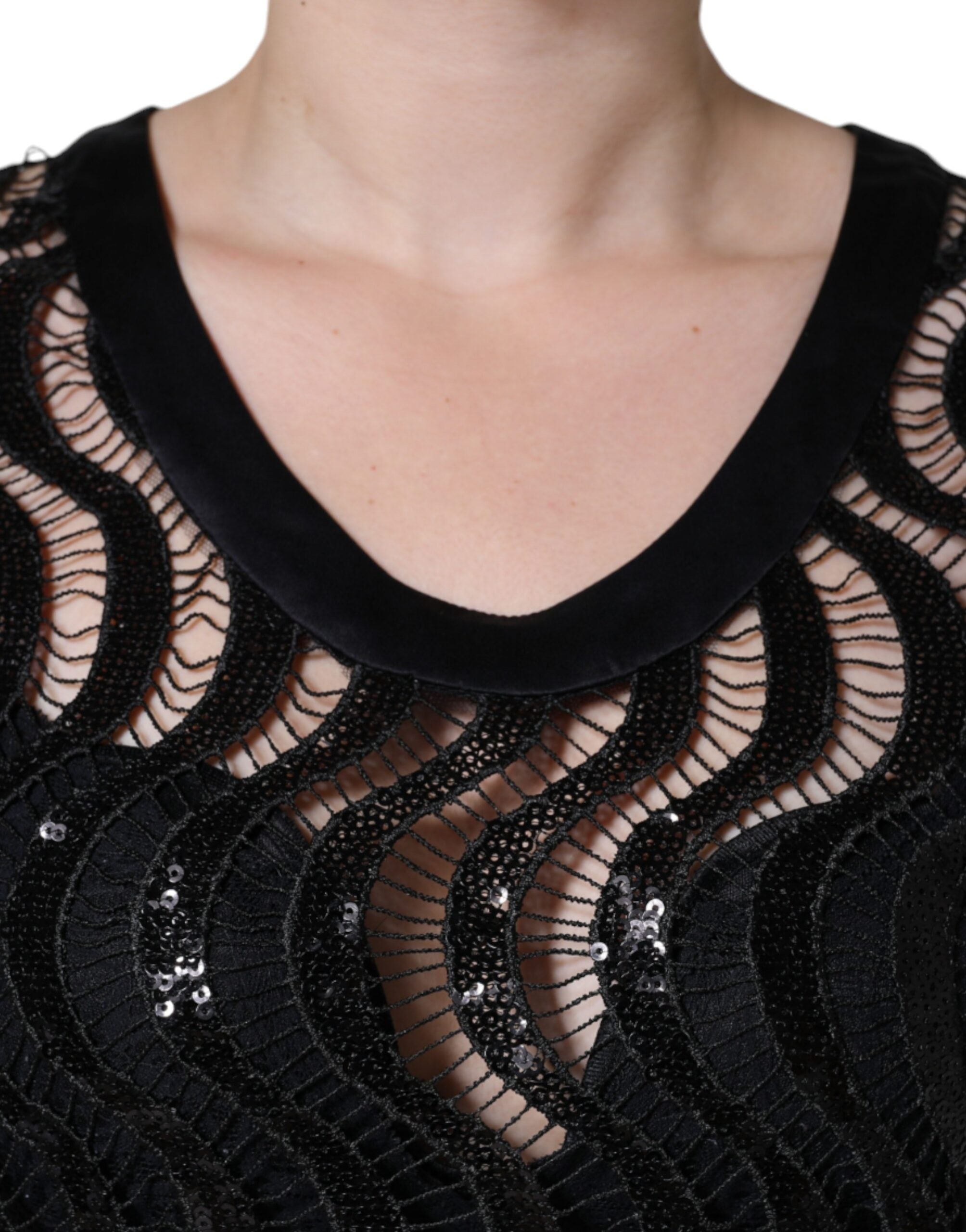 Black sequin sleeveless tank blouse top by Dolce & Gabbana with shiny sequins and a stylish sleeveless design.