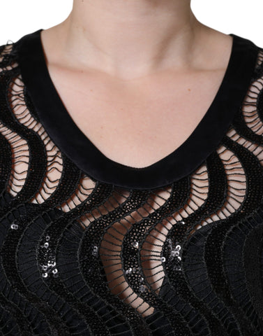 Black sequin sleeveless tank blouse top by Dolce & Gabbana with shiny sequins and a stylish sleeveless design.