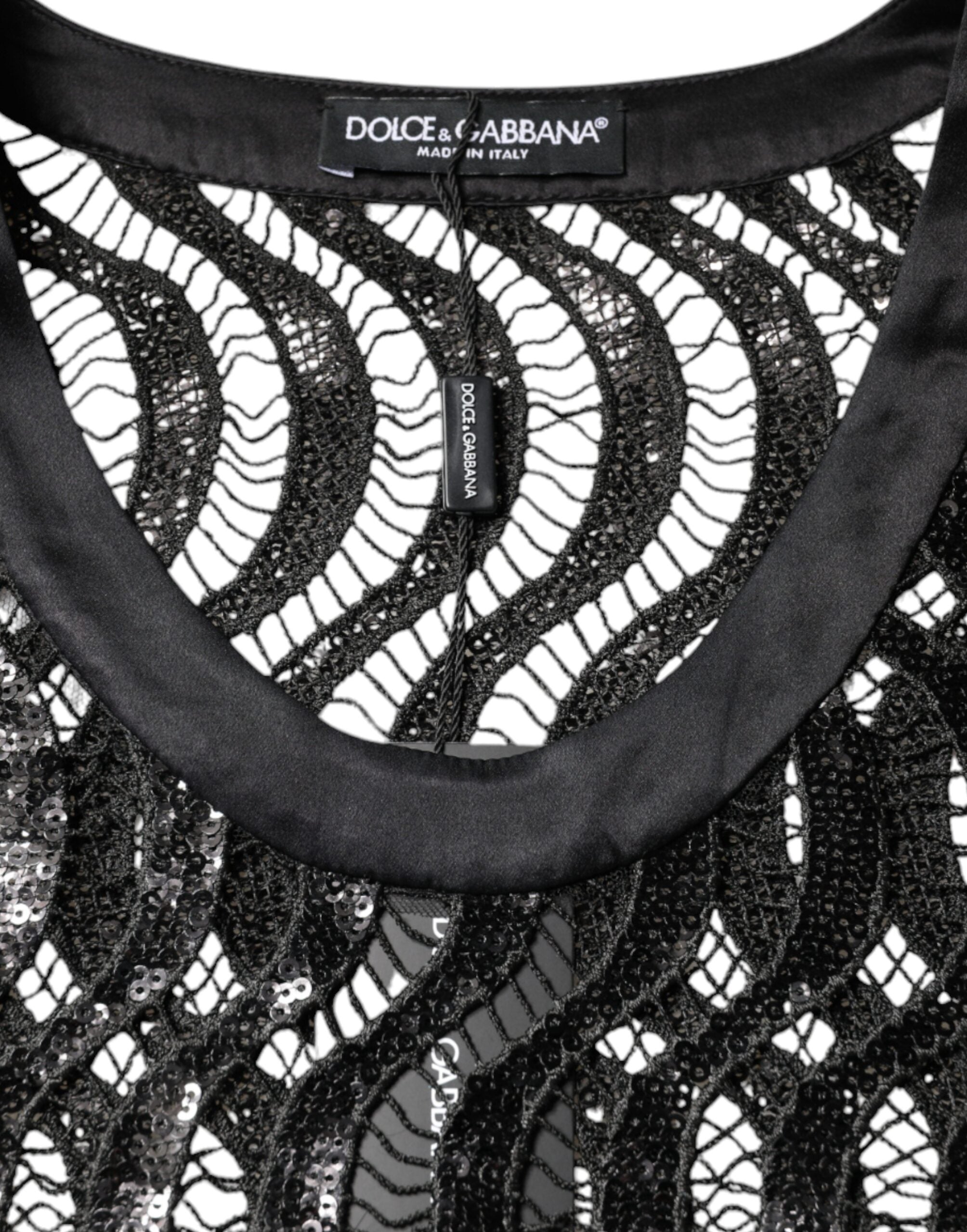 Black sequin sleeveless tank blouse top by Dolce & Gabbana with a fitted design and shimmering sequin embellishments.