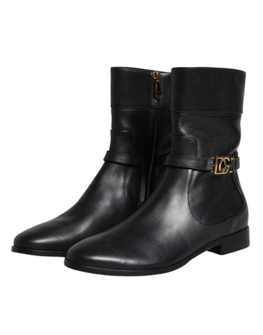 Black leather mid-calf boots with Dolce & Gabbana logo detail, stylish footwear with a sleek, polished finish.