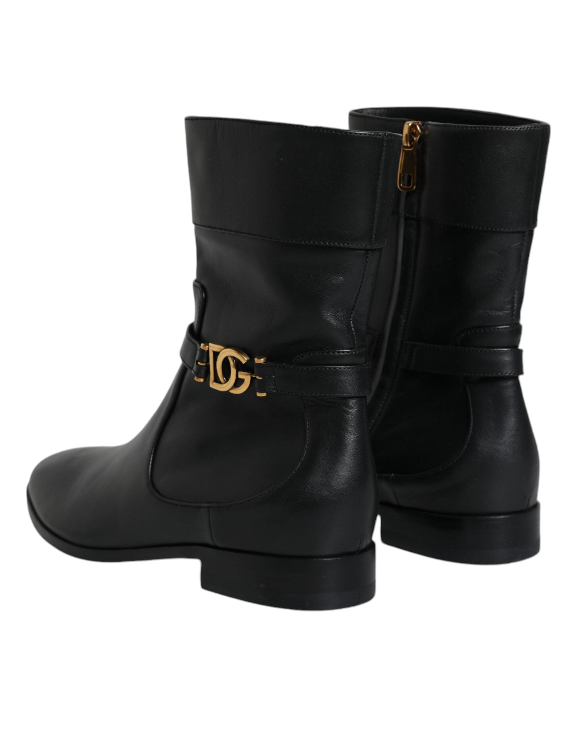 Black leather mid-calf boots with Dolce & Gabbana logo, stylish footwear featuring sleek design and sturdy heel.