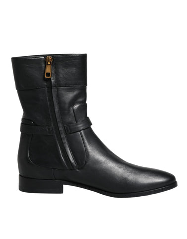 Black leather mid-calf boots with Dolce & Gabbana logo, stylish footwear featuring sleek design and sturdy heel.