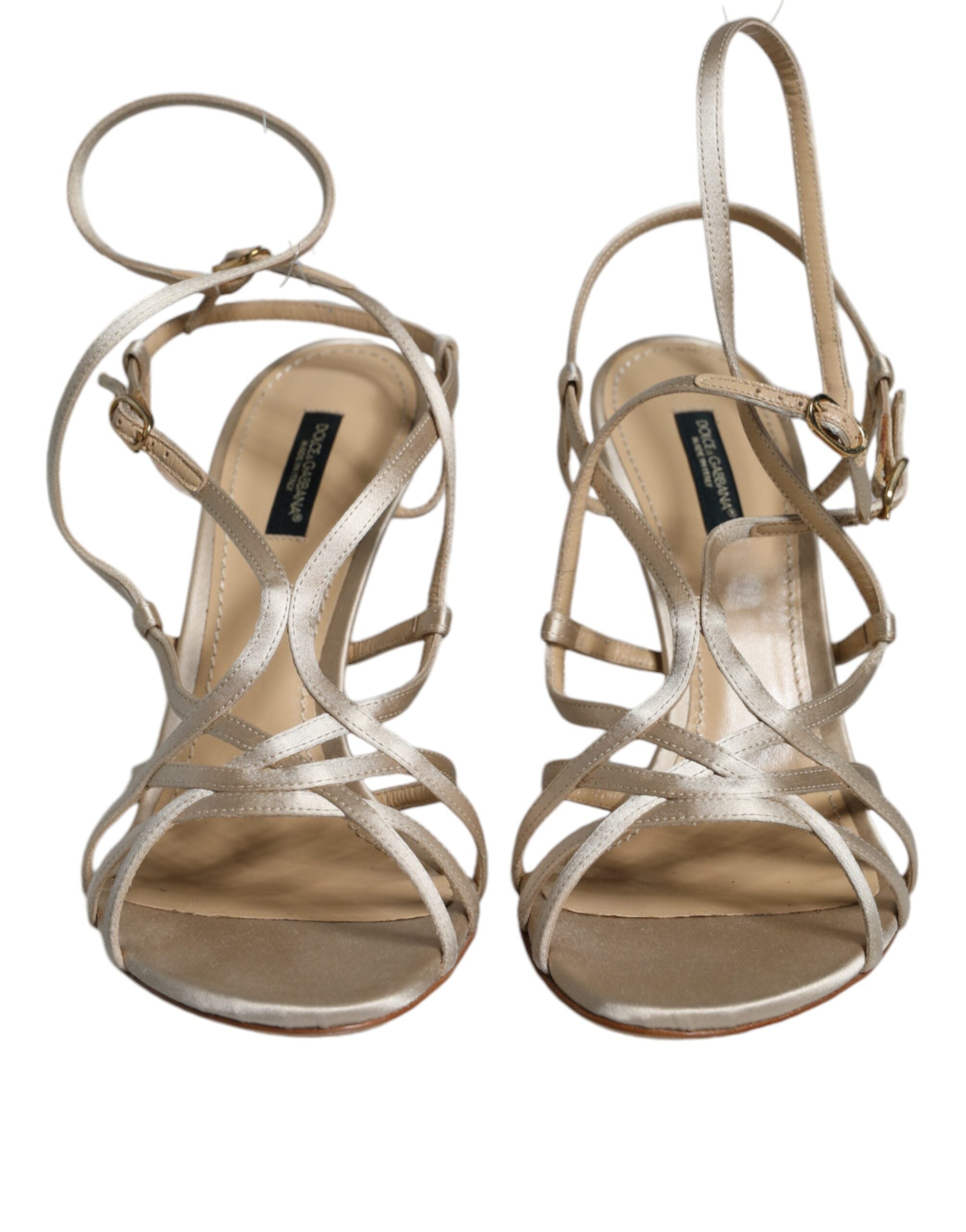 Beige leather stiletto heels sandals by Dolce & Gabbana, featuring sleek design and high heel, perfect for elegant occasions.