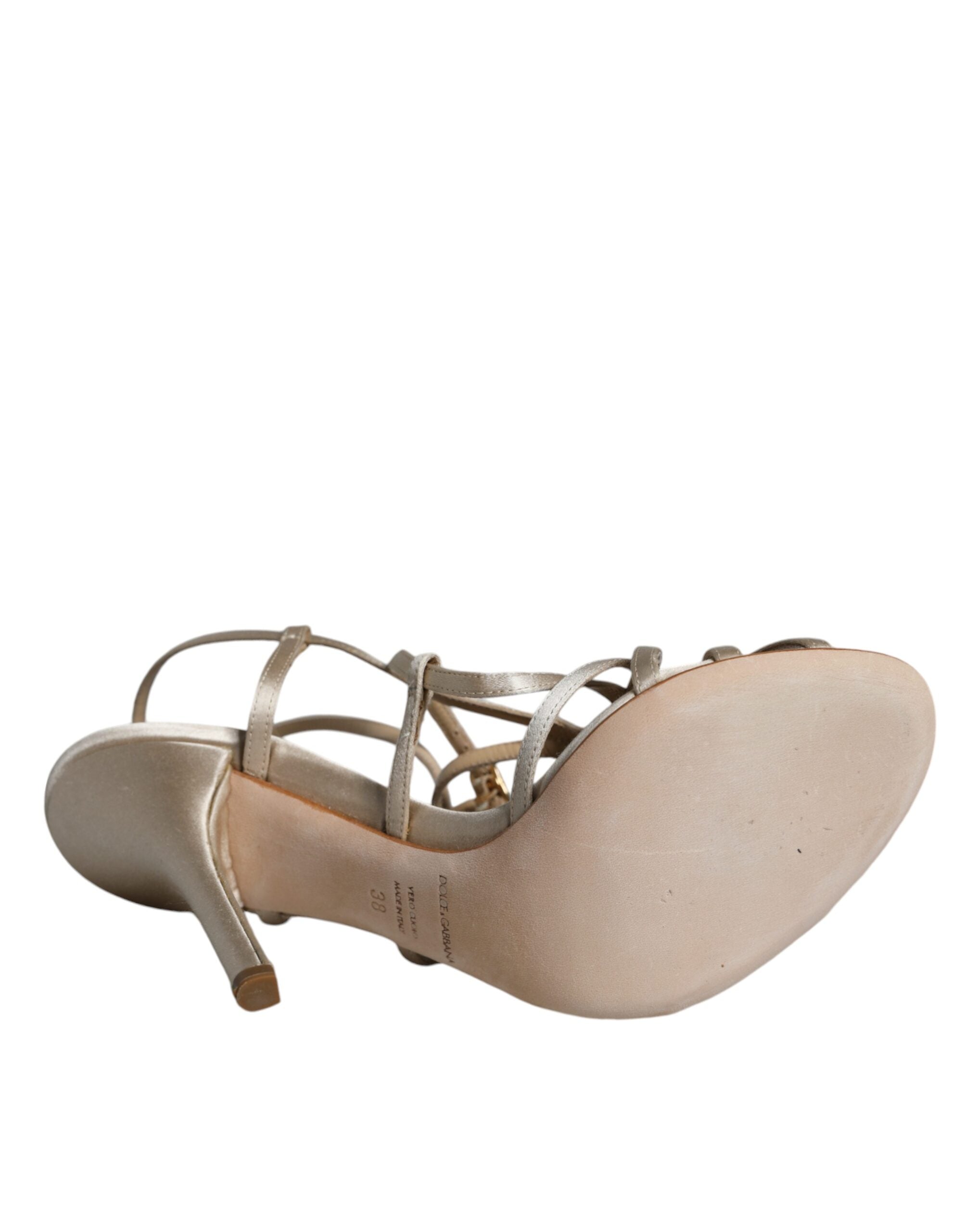 Beige leather stiletto heel sandals by Dolce & Gabbana, featuring sleek design and open toe style.