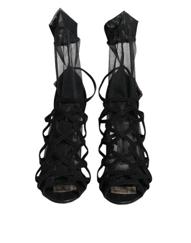 Black tulle stretch heels sandals by Dolce & Gabbana with elegant open toe design and ankle strap for a stylish look.