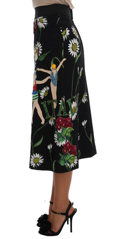 Black embellished daisy brocade skirt by Dolce & Gabbana with intricate floral embroidery and textured fabric.