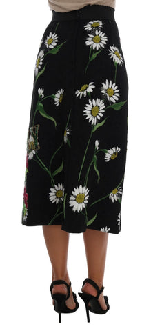 Black embellished daisy brocade skirt by Dolce & Gabbana with floral embroidery and ornate detailing.