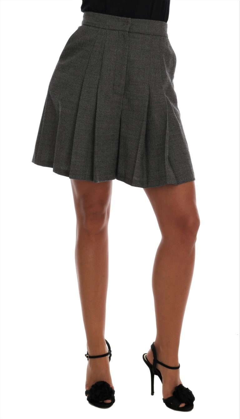 Gray wool high-waist mini shorts by Dolce & Gabbana, showing fitted design and tailored waistband.