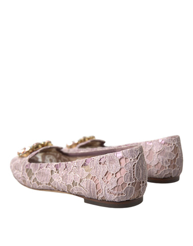 Pink lace ballet flats with crystal embellishments by Dolce & Gabbana, featuring a sleek loafer-inspired design and elegant detailing.