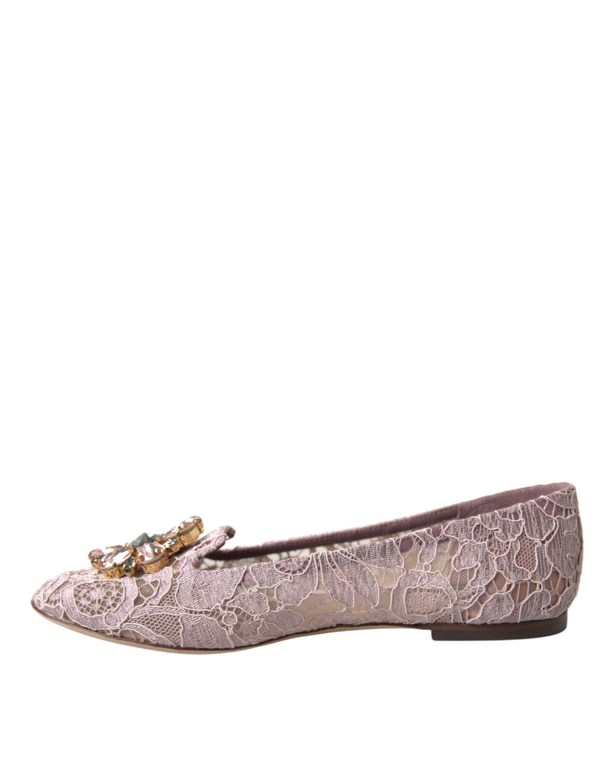 Pink lace crystal ballet flats loafers by Dolce & Gabbana with delicate lace design and sparkling crystal accents.