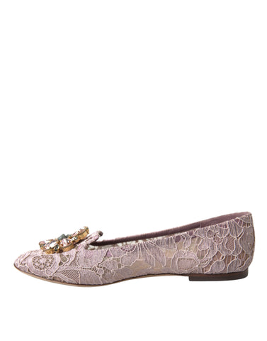 Pink lace crystal ballet flats loafers by Dolce & Gabbana with delicate lace design and sparkling crystal accents.
