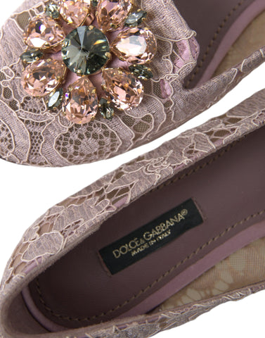 Pink lace crystal ballet flats loafers by Dolce & Gabbana with delicate lace details and sparkling crystal embellishments.